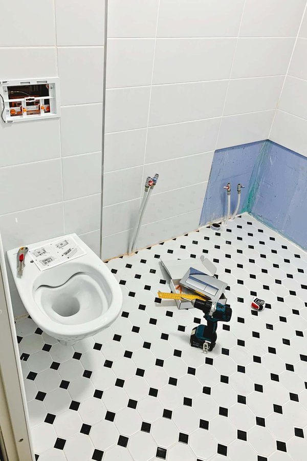 What is the process for safely installing a tow bar on a mid-sized family car?